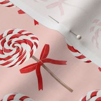 whirly pop - Christmas red and white on rose