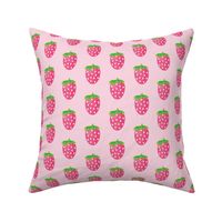 large strawberries on pink