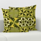 Traditional quilt in earthy greens