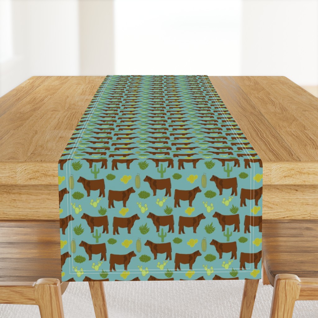 Red Angus cow breed cactus desert fabric teal