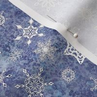snowflakes - geometric shapes on denim blue