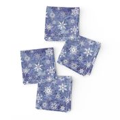 snowflakes - geometric shapes on denim blue