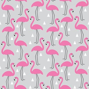 small flamingos on grey