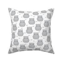 grey hippos on white