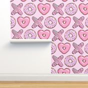 X O  heart shaped donuts -  pink  on pink