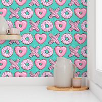 X O  heart shaped donuts - xo heart donuts on dark teal 