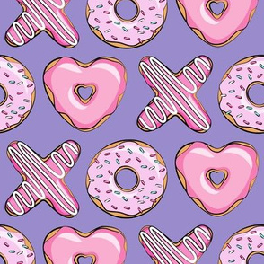 X O  heart shaped donuts -  pink  on purple
