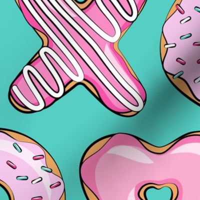 (jumbo scale) X O  heart shaped donuts - xo heart donuts on dark teal 