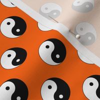 One Inch Black and White Yin Yang Symbols on Orange