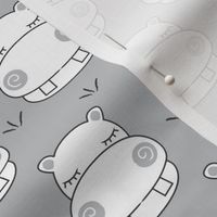 white hippos on grey