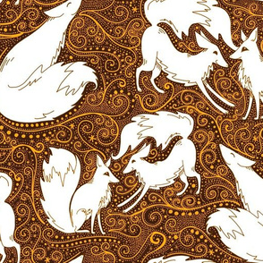 Frolicking foxes in spiced orange