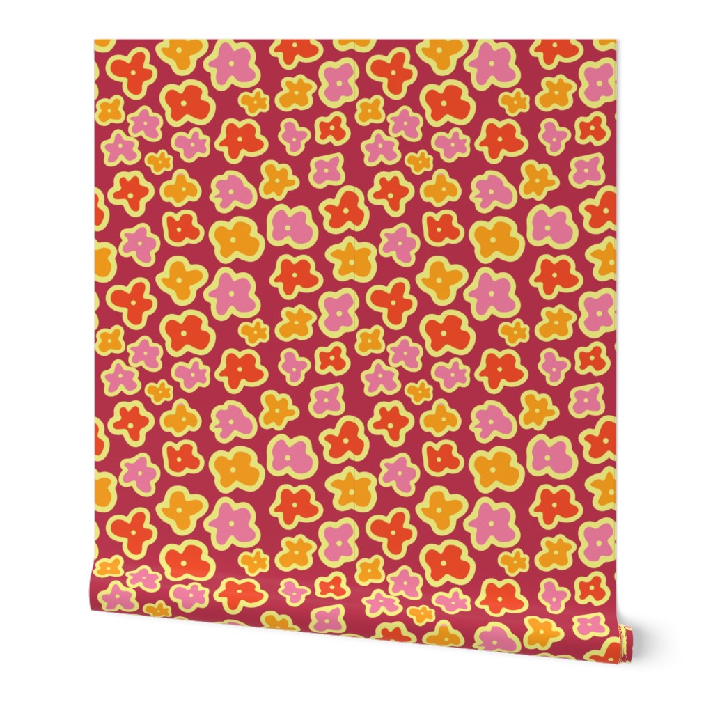 Yellow, pink, red, and orange doodle flowers on a purple background