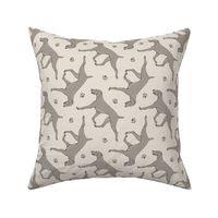 Trotting Weimaraner and paw prints - beige