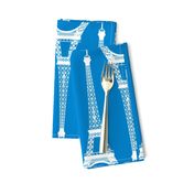 Twelve Inch White Eiffel Tower on Turquoise Blue