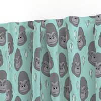 gorillas and leaves on teal