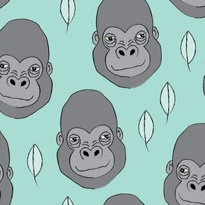 gorillas and leaves on teal