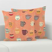 Steaming tea cups on a coral background. Colorful coffee mugs. Hot beverage. 