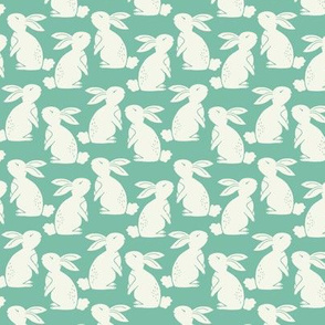 White bunny rabbits on mint green