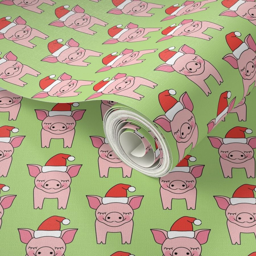 pigs and santa hats on green