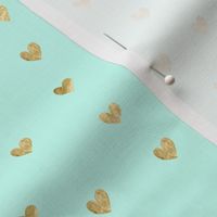 Gold hearts. Mint pattern