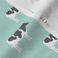 cows on dark mint - farm fabric