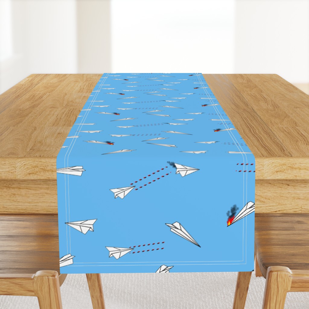 paper airplane dog fighters  on blue