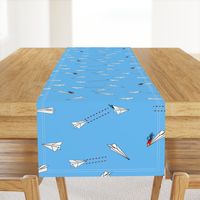 paper airplane dog fighters  on blue