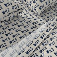 WILD || typography tan and navy