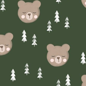 baby bear with trees on green
