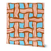 weaved bacon on blue