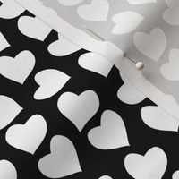 Valentines joy // black background white hearts