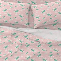 Narwhal Mint and pink background