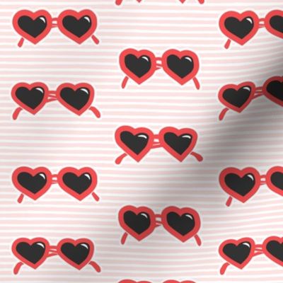 heart shaped fashion glasses on stripes  (PR)