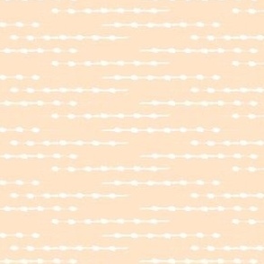 Light honey yellow and white thin horizontal nubby textured stripes with dots