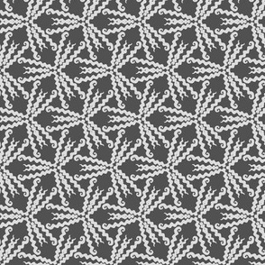 Twisted Triangular Stars - Geometric in white on grey