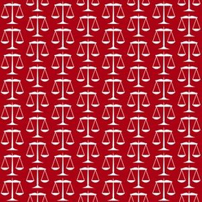 Small White Scales of Justice on Dark Red