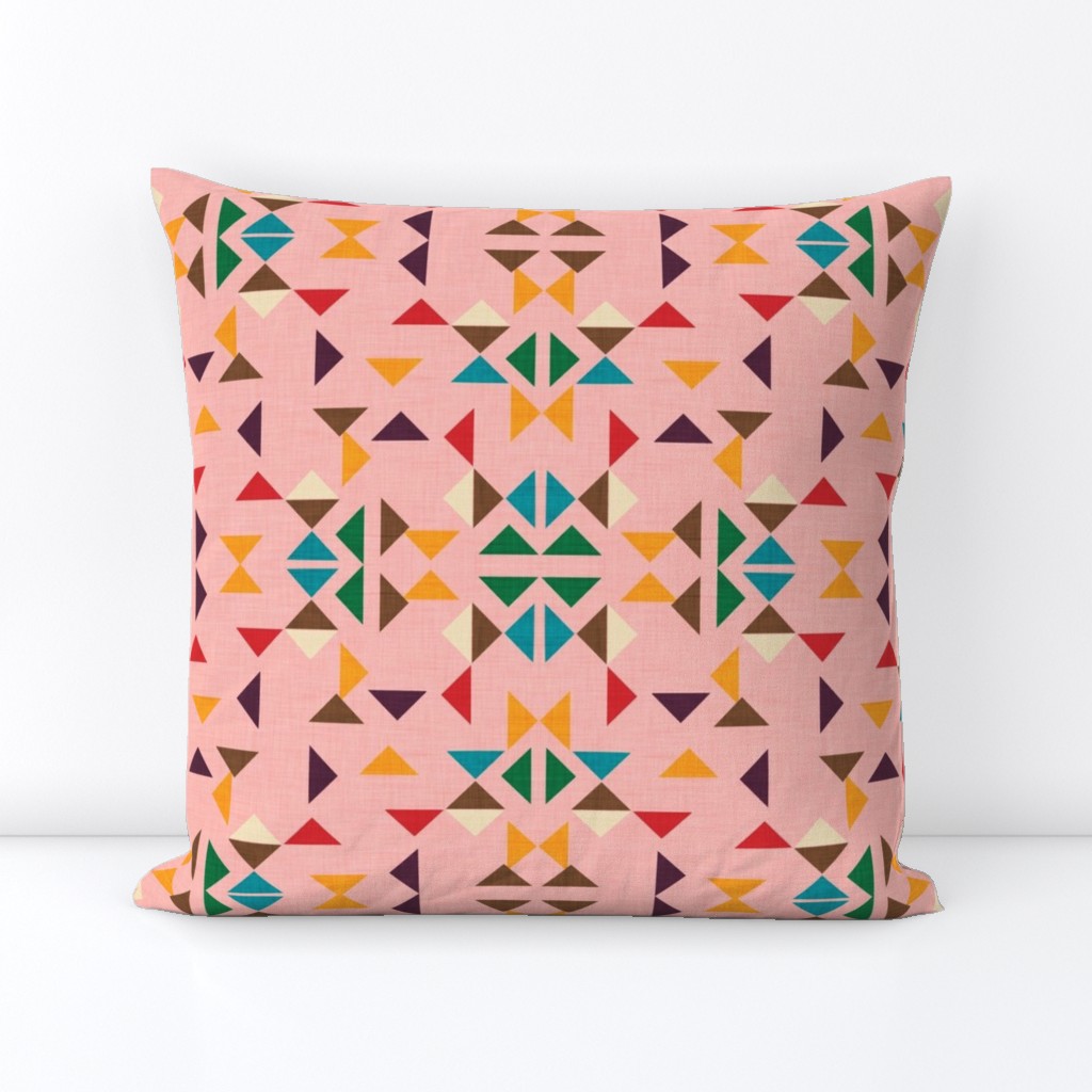 kilim triangle pink background