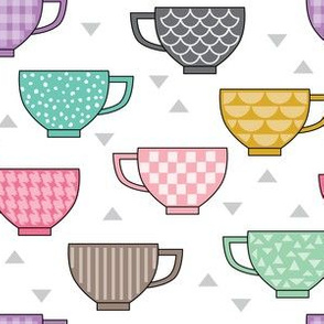 teacups with patterns on white