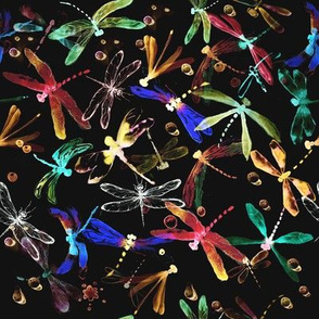 Neon dragonflies on the black