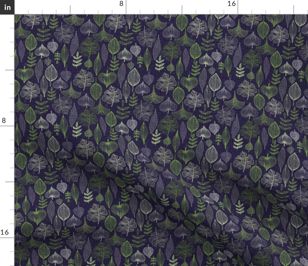 Green leaves on purple background