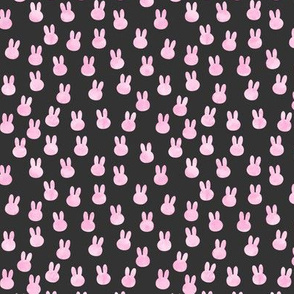 small bunnies in pink on dark grey