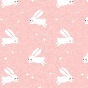 bunnies on pink linen