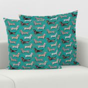 Small scale // Origami Dachshunds sausage dogs // turquoise green background