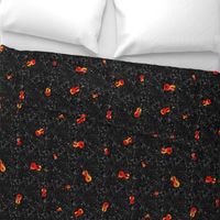 scattered red and orange violins on black