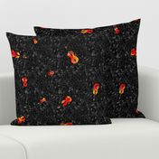 scattered red and orange violins on black