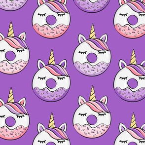 unicorn donuts (purple and pink) on purple