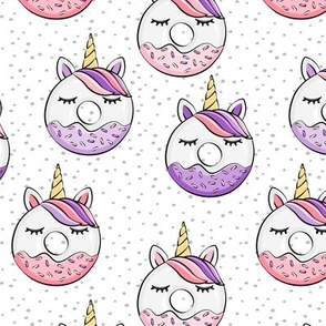 unicorn donuts (purple and pink) on spots