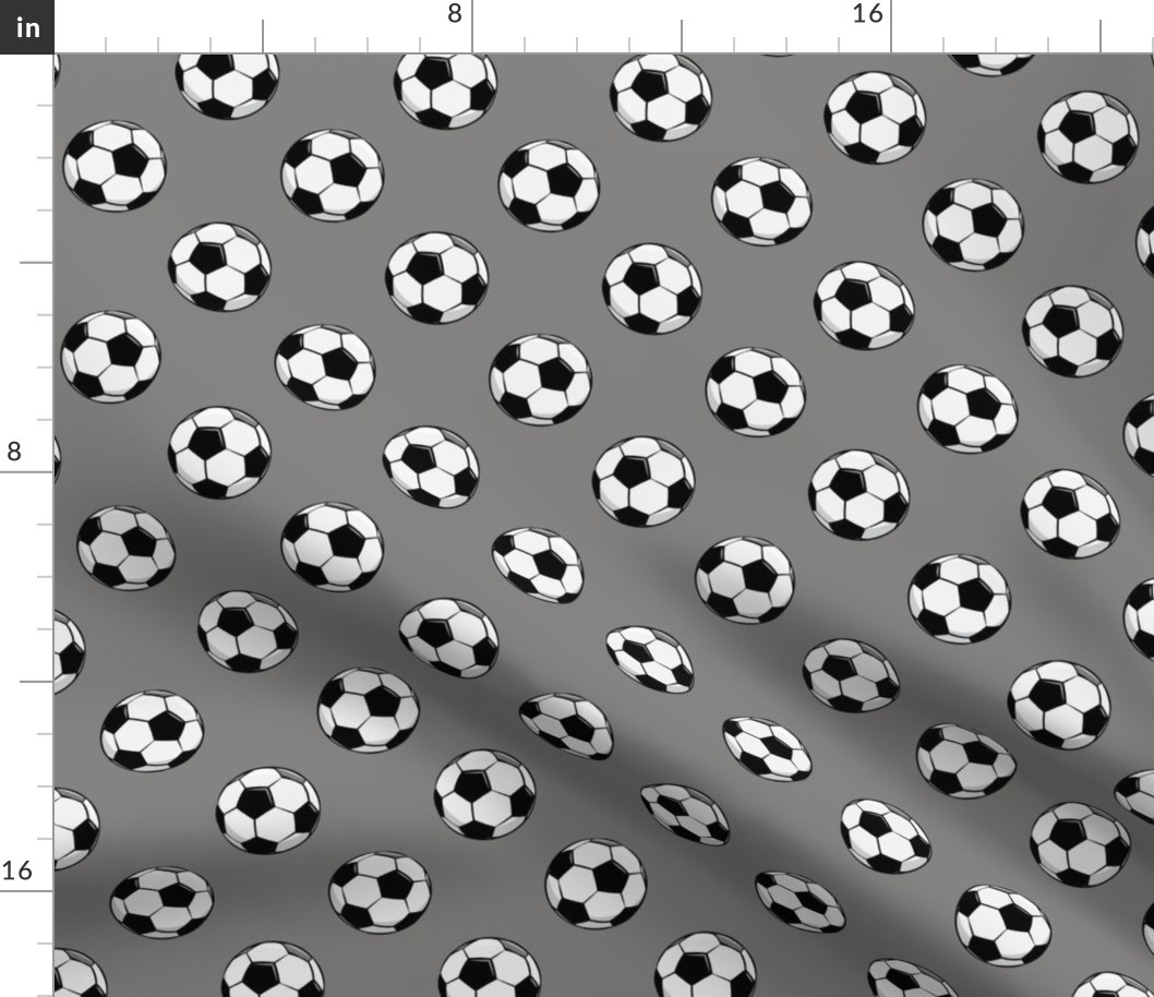 soccer balls on grey