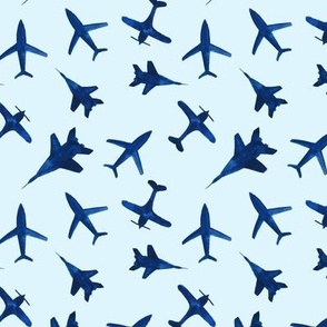 Watercolor airplanes on blue