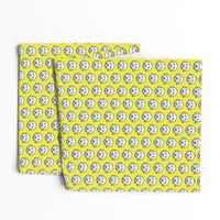 Mini Goldendoodle dogs on sunny yellow background